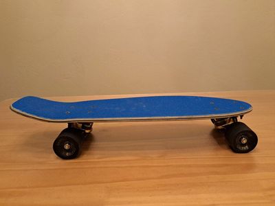vintage Penny board with Gold Trucks