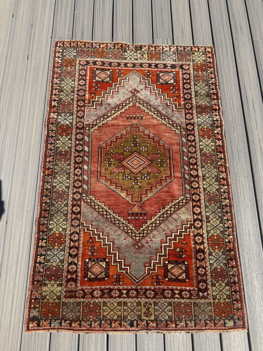 One of a kind Turkish Anatolian hand knot wool rug. Approximately 4”x6”. New with tags from Sundance. MSRP $1500.