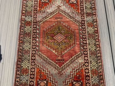 One of a kind Turkish Anatolian hand knot wool rug. Approximately 4”x6”. New with tags from Sundance. MSRP $1500.