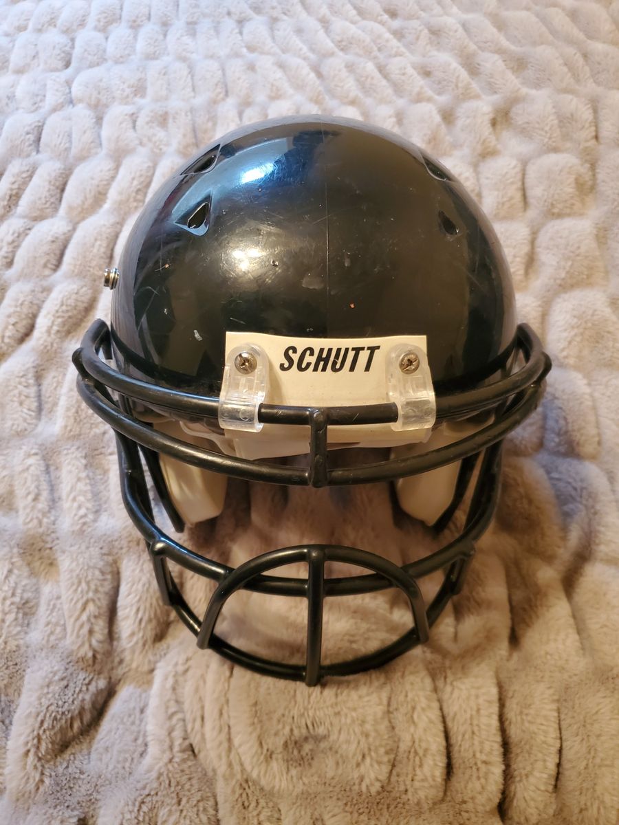 Dark blue Schutt football helmet
