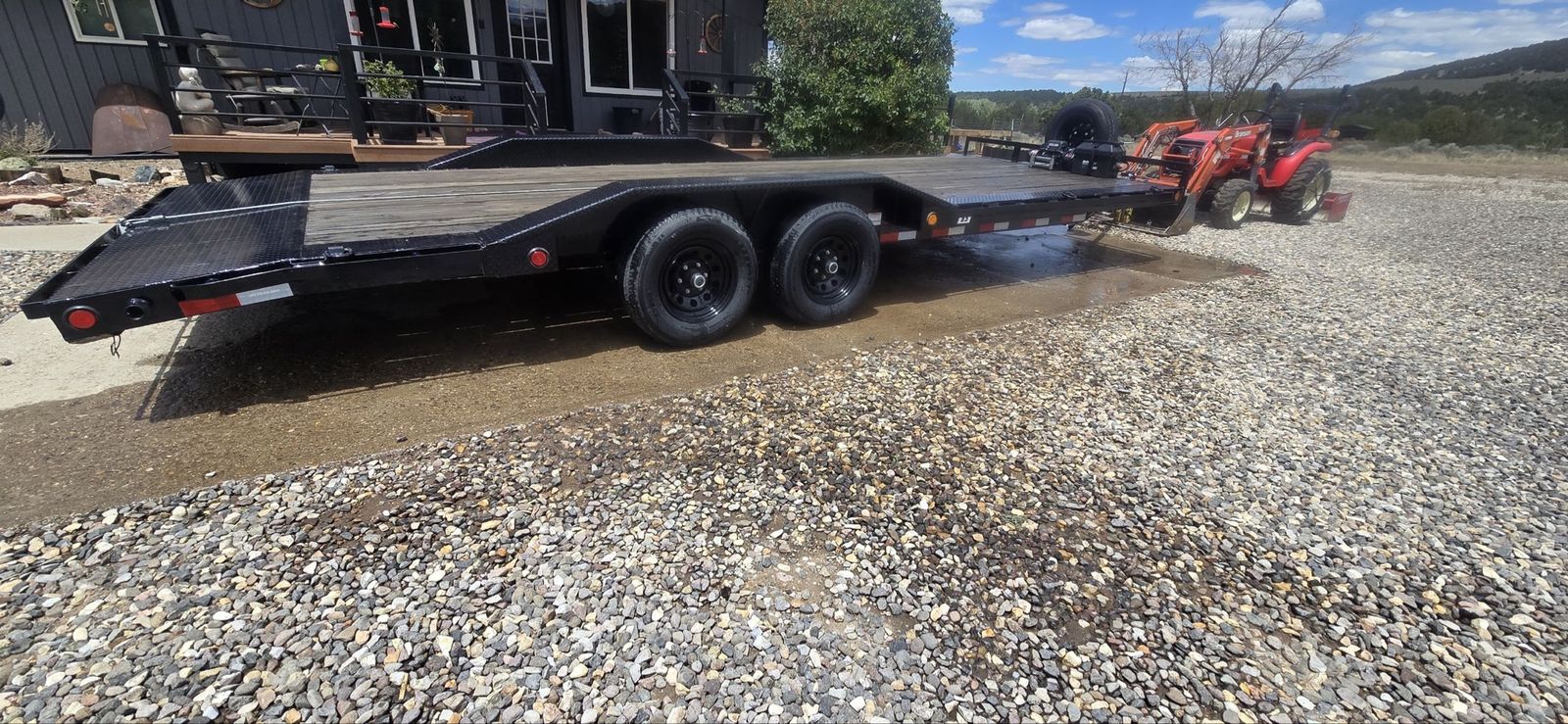 PJ Trailers Flatbed Car Hauler Trailer with drive over fenders. 22.5 ft with Solar Powered Winch and Spare Tire