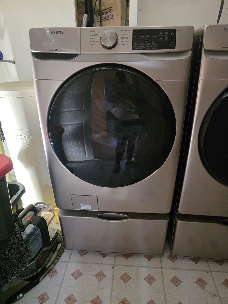 Samsung Front Load Washer and Electric Dryer Set with Pedestals