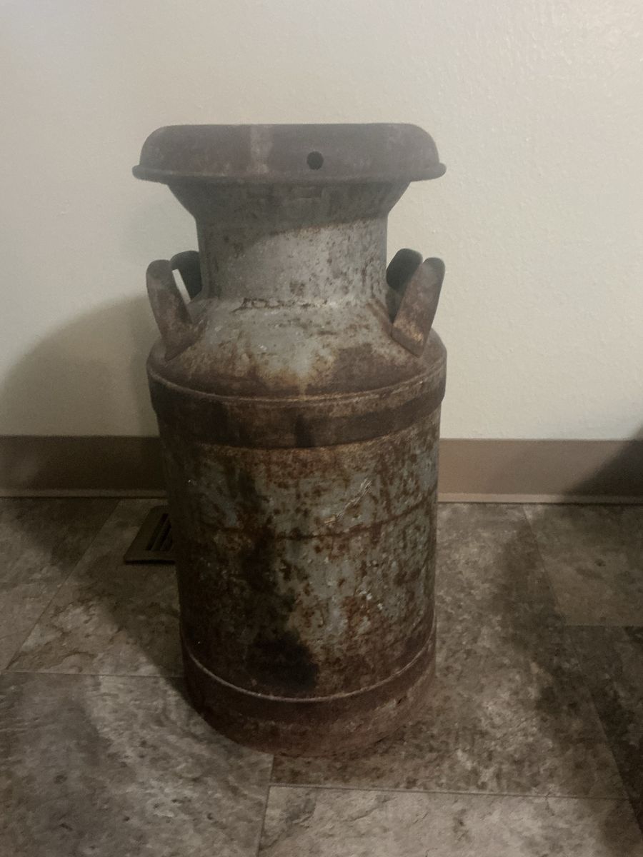 Antique milk jug