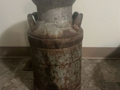 Antique milk jug