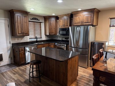 Kitchen cabinets knotty alder