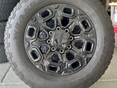 4 Goodyear Wrangler LT275/65R20 on 20" GM 8 lug 3/4 or 1 Ton Wheels