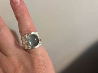Silver Wide Band Statement Ring with Oval Greenish-Blue Cabochon Stone