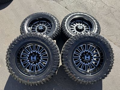 HOSTILE Black 20" Wheels & PATRIOT Rugged Terrain 35X12.50R20LT Tires for Ram (Set of 4)