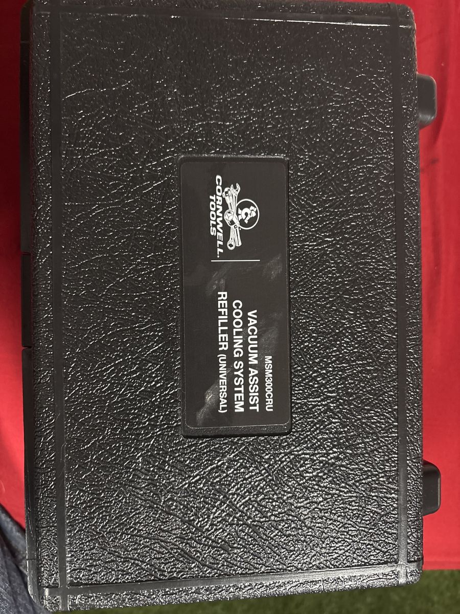 Cromwell vacuum assist cooling system refiller