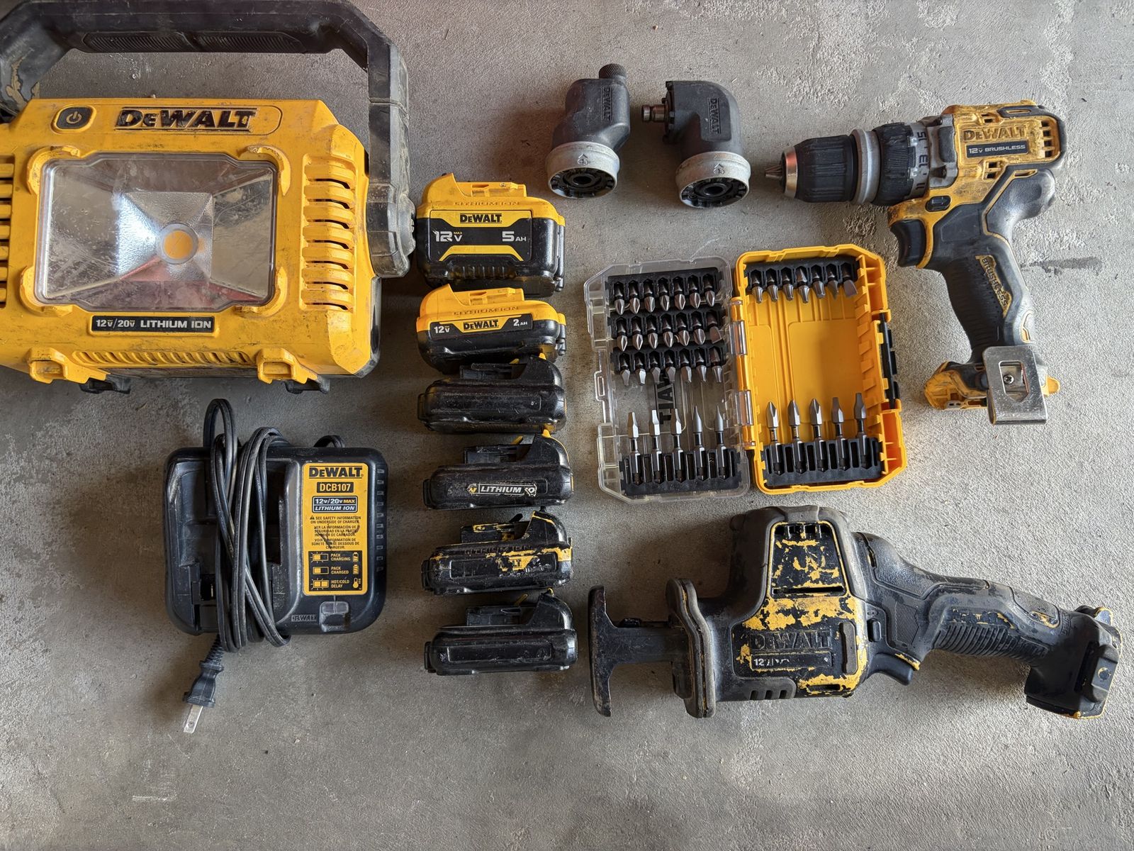 DEWALT 12V MAX Power Tool Combo Kit with Light, Reciprocating Saw, 5 piece Drill, 6 Batteries & Charger with screwdriver kit.