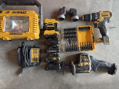 DEWALT 12V MAX Power Tool Combo Kit with Light, Reciprocating Saw, 5 piece Drill, 6 Batteries & Charger with screwdriver kit.