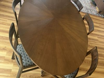74” OVAL DINING TABLE & 6 CHAIRS — $600