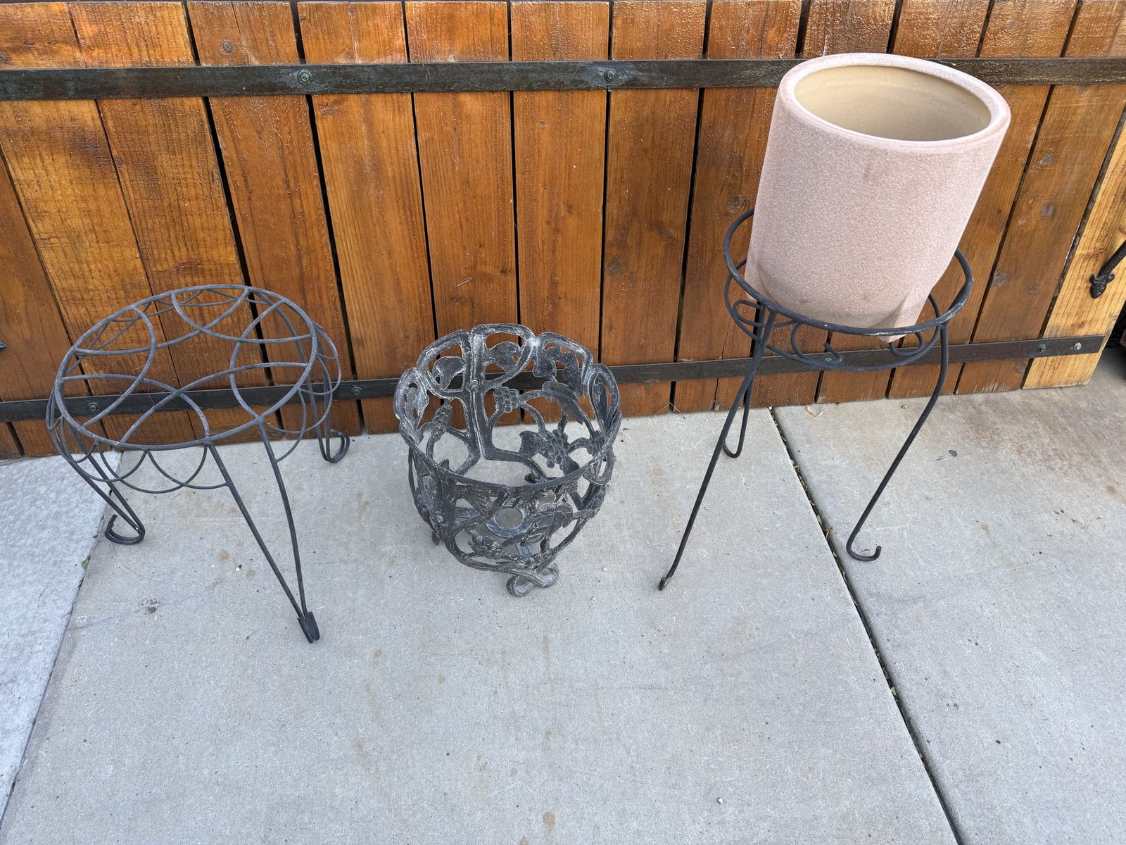 Plant stands $20 each 15” and 21” cast iron pot holder $35 12.5 T ceramic pot $20 10”