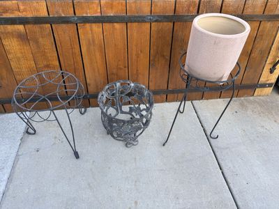 Plant stands $20 each 15” and 21” cast iron pot holder $35 12.5 T ceramic pot $20 10”