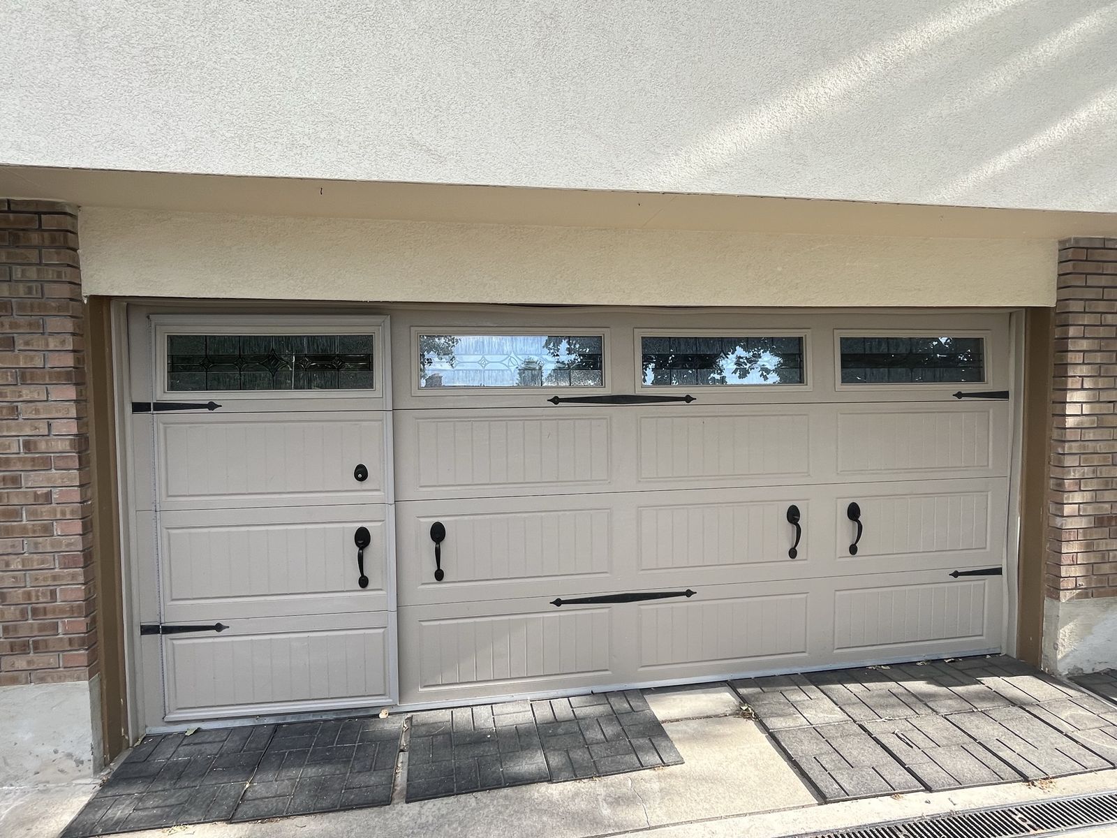 Sectional insulated Garage Door with Windows and Integrated Pedestrian Door, Custom Garaga brand