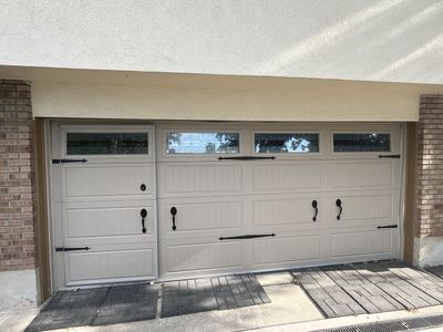 Sectional insulated Garage Door with Windows and Integrated Pedestrian Door, Custom Garaga brand