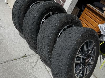 20” GMC stock rims 8x180 with Toyo tires