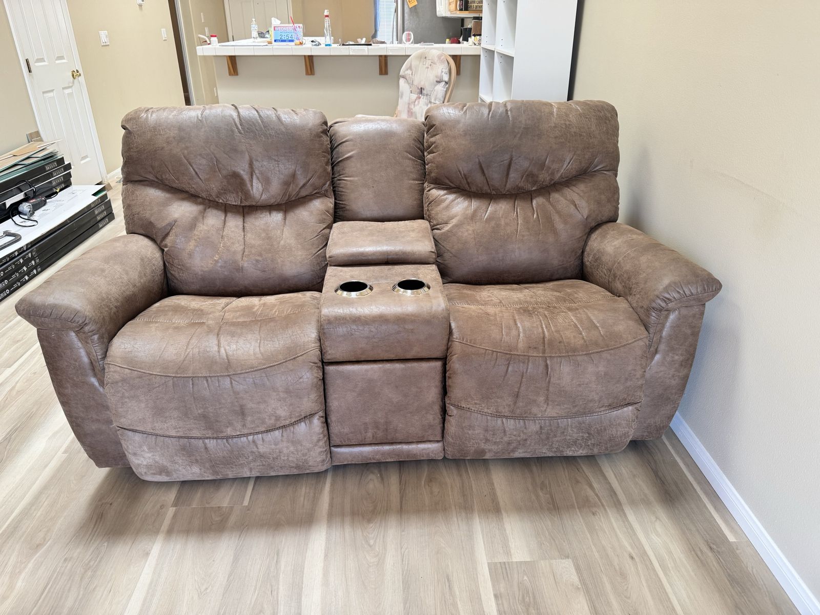 Brown Reclining Loveseat with Center Console and Cupholders