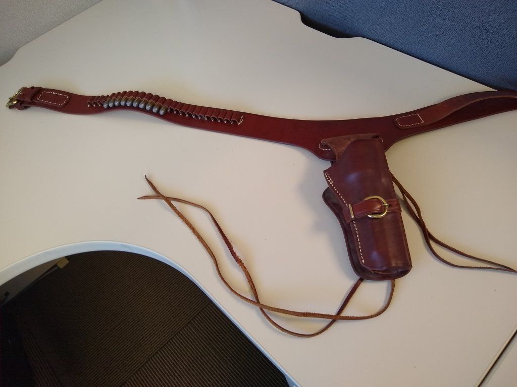Western Brown leather belt with holster for a Colt 45 hooks 25 rounds of ammo