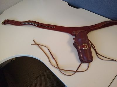 Western Brown leather belt with holster for a Colt 45 hooks 25 rounds of ammo