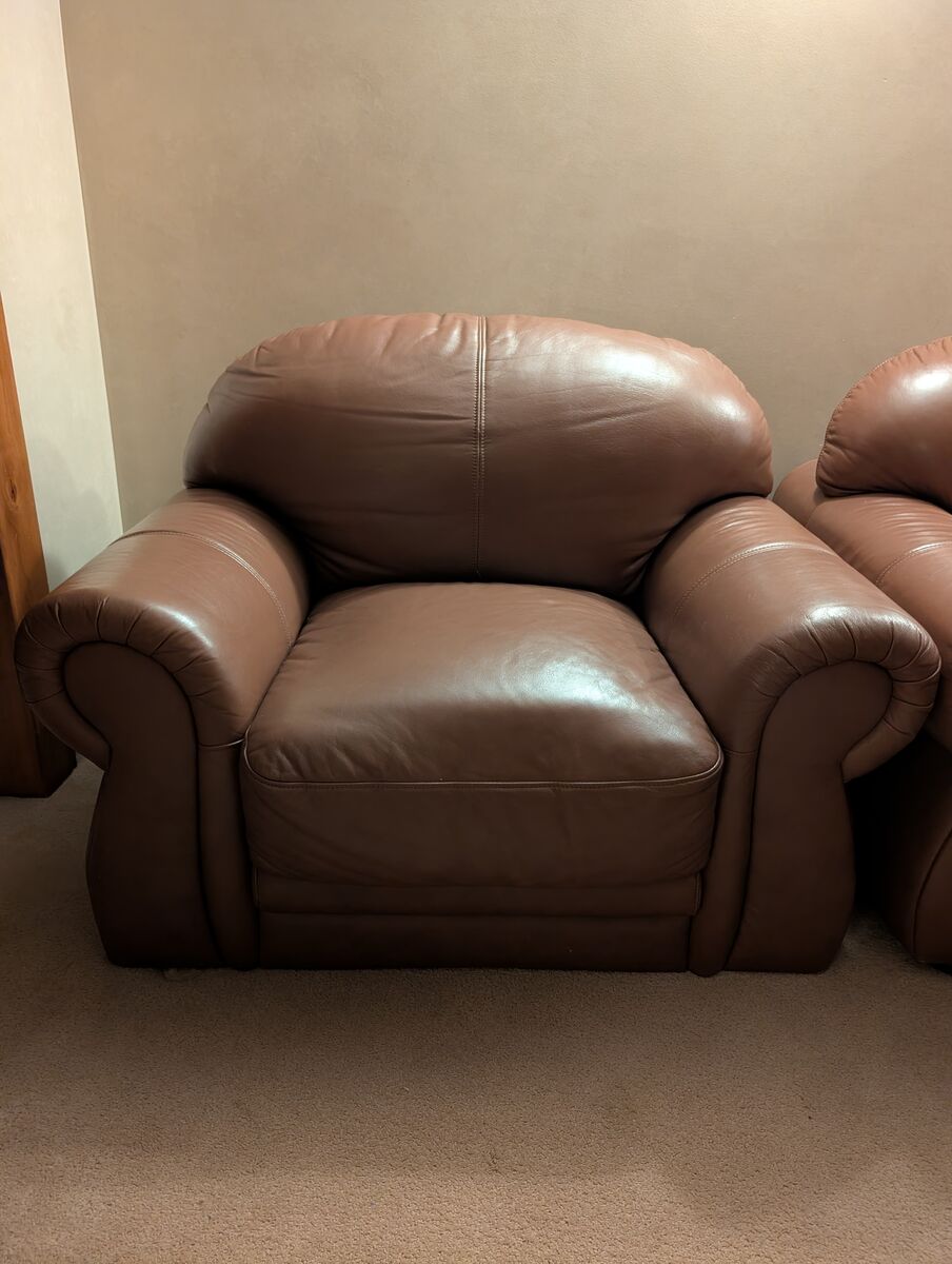 Brown Leather chair and ottoman