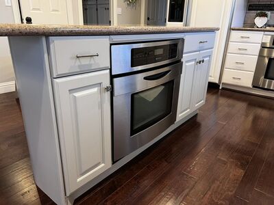 Kitchen Island with Granite Counter w/ Oven if Interested