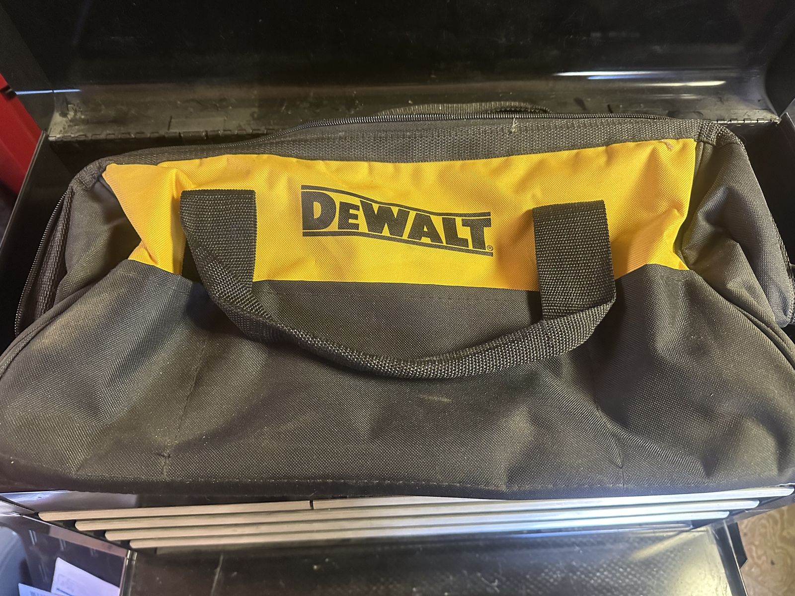 Two Dewalt tool bags