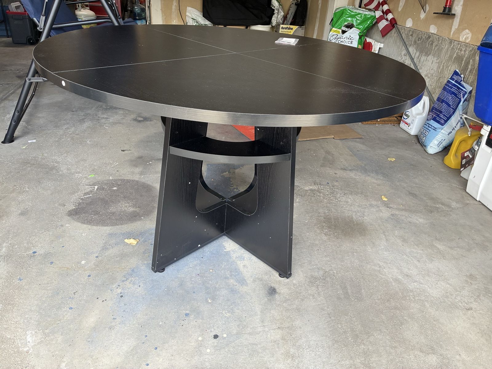 Round Black Dining Table with Pedestal Base - Modern and Versatile