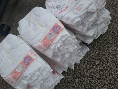 Free size 1 and 2 diapers / toys