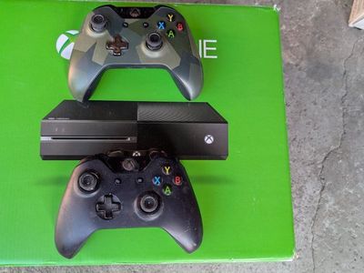 Xbox One with 2 controllers and game collection