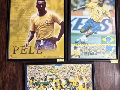 Vintage soccer posters of legend Pele.