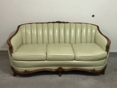 Vintage carved wood sofa