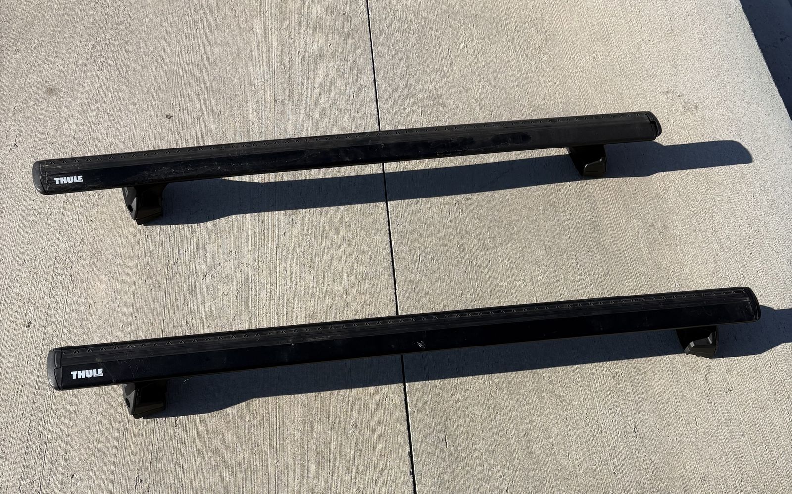 Thule cross bars for travel carrier