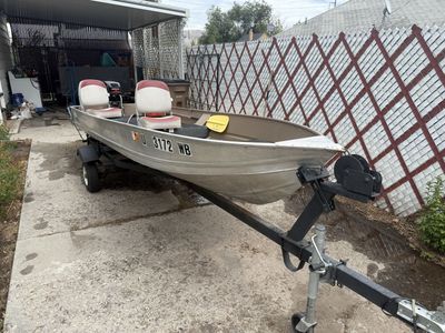 14’ John boat “Sea nymph” with a 15 hp outboard motor