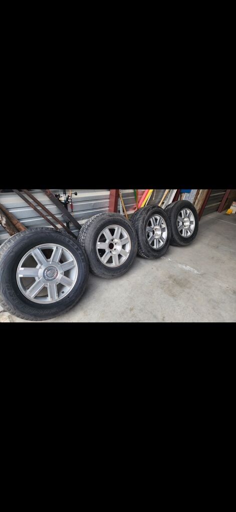4 Escalade Wheels & Tires Complete With Lug Nuts