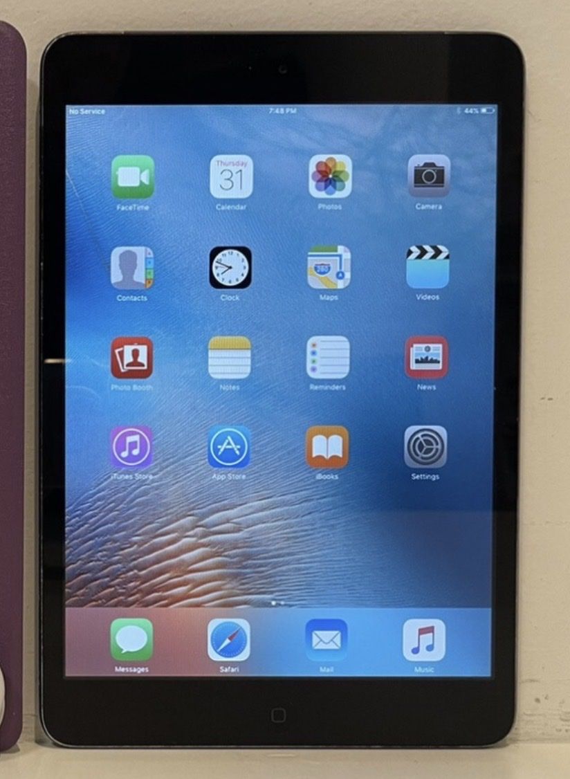Apple iPad Mini with Purple Smart Cover Case