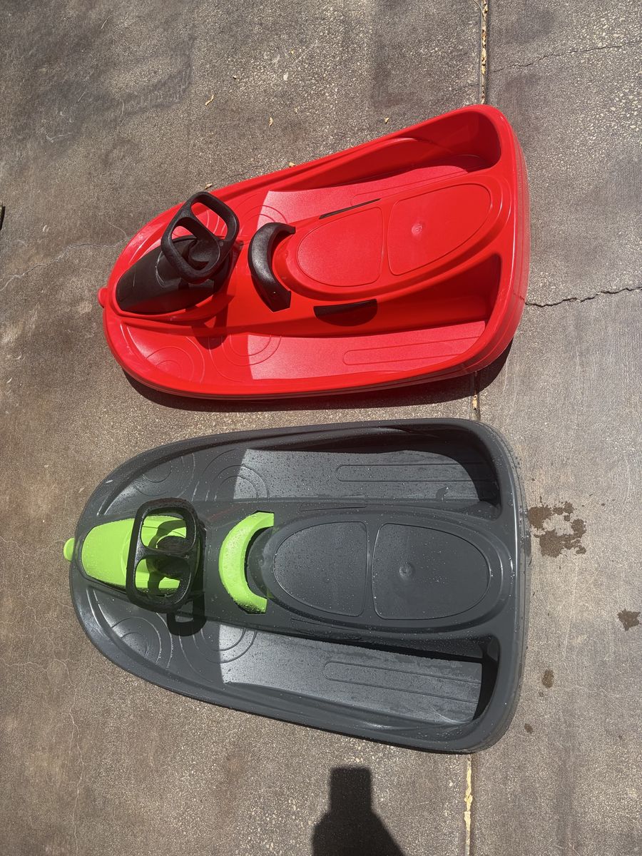 Pair of Snow Sleds -Steering Wheel brakes and retractable tow rope