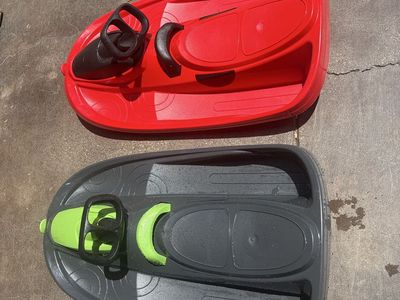 Pair of Snow Sleds -Steering Wheel brakes and retractable tow rope