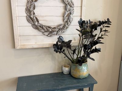 Rustic wooden leaf wreath wall art