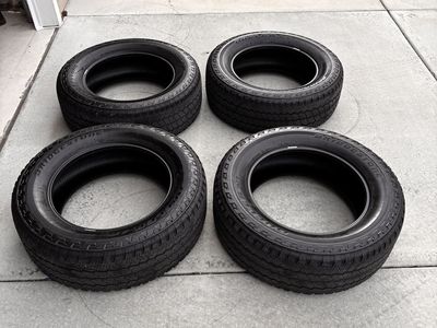 4 Bridgestone Dueler A/T Truck Tires 275/65R20 M+S