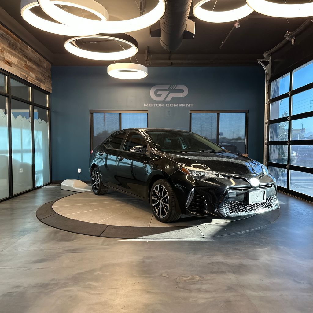 2017 Toyota Corolla SE — rebuilt & branded title, 7% below market