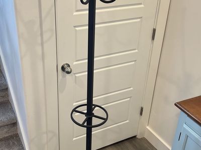 Black wrought iron coat rack with umbrella holder | 72" tall