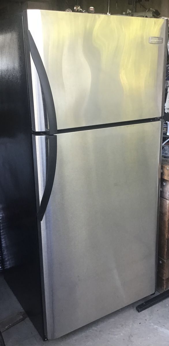 Frigidaire Top Freezer Refrigerator - Stainless Steel Finish, Good Condition. Includes free delivery !