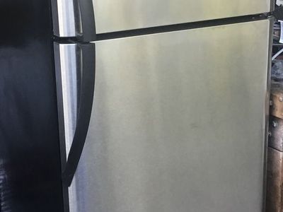 Frigidaire Top Freezer Refrigerator - Stainless Steel Finish, Good Condition. Includes free delivery !