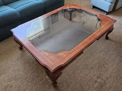 Ornate Wood Coffee Table with Glass Top - Carved Legs & Details