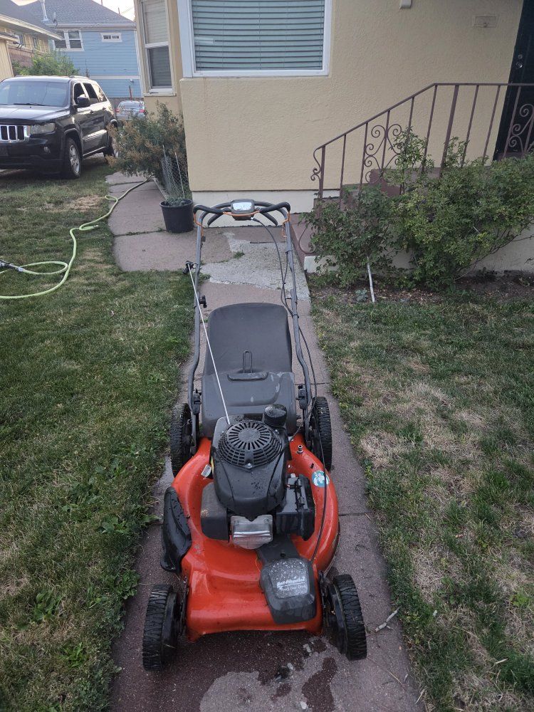 Husqvarna Gas lawn mower self propelled good working condition s  with the Honda motor. 