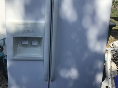 Very clean Kenmore Side-by-Side Refrigerator with Water & Ice Dispenser - White. Includes free delivery!