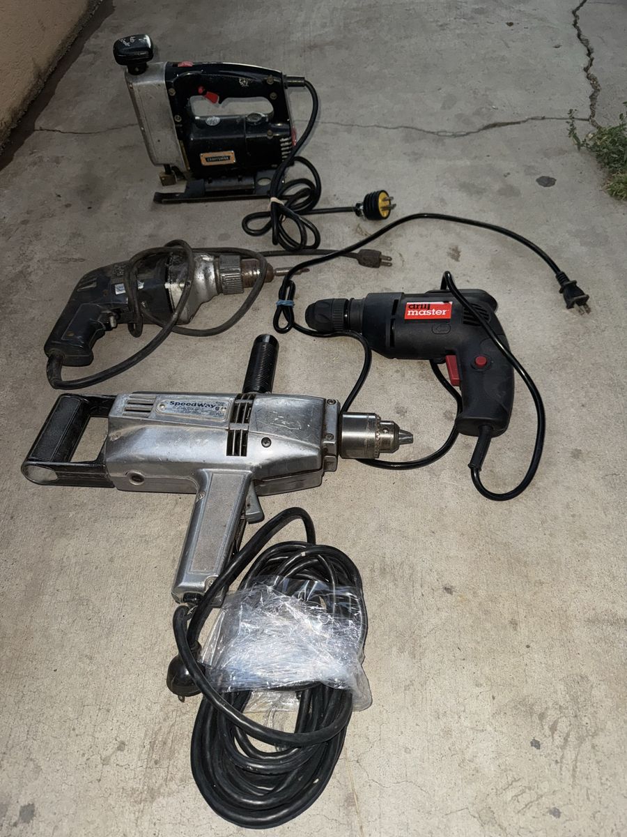 Vintage electric drill and saw