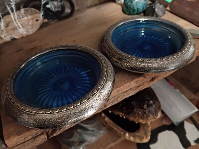 Pair of vintage silver trimmed champagne caddies.