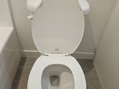 White Ceramic Toilet with Bemis Seat